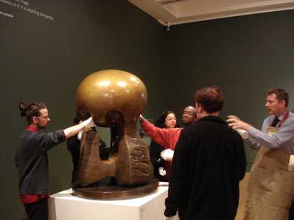 Learning event participants with Henry Moore sculpture