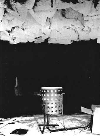 Marcel Duchamp Twelve Hundred Coal Bags Suspended from the Ceiling over a Stove 1938