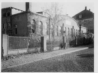 Exterior of the Karl Max Seifert lamp factory c1906 to 1907 black and white photograph of the factory from a cobbled road