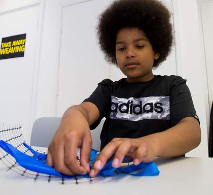Boy weaving © Tate