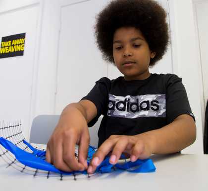 Boy weaving © Tate