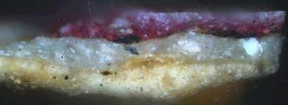 Fig.13 Cross-section through a highlight in the red drapery, photographed at x200 magnification. 