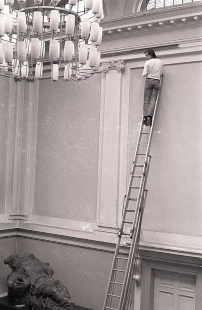 Fig.14 Blinky Palermo making his wall painting Blue/Yellow/White/Red in August 1970, for Strategy: Get Arts at the Edinburgh College of Art, 1970