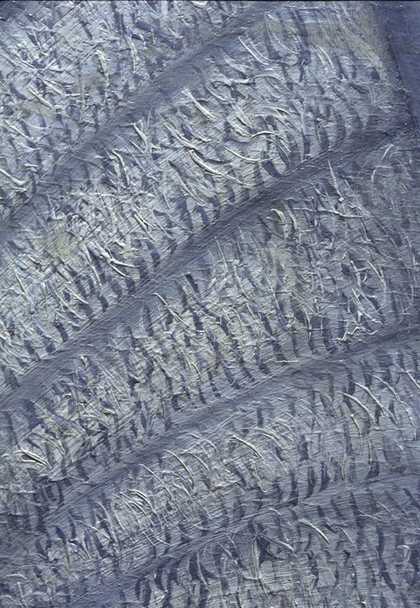 Fig.15 Detail of a sleeve in slightly raking light, to show small detailing applied on top of larger