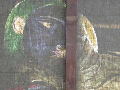 Detail of the woman’s face in transmitted light viewed from reverse