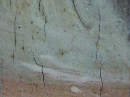 Fig.16 Detail at x20 magnification of the blue pigment in the eyeball of the sitter’s right eye