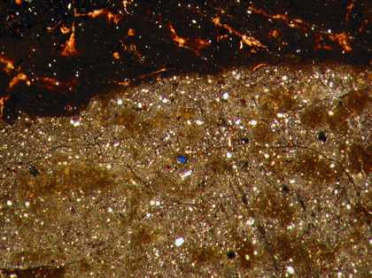 Fig.18 Detail at x12 magnification of strongly coloured blue smalt in the grey sash