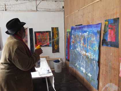 Fig.19 Bowling spraying water over a painting on the wall