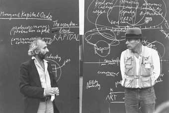 Fig.1 Richard Demarco and Joseph Beuys in front of blackboards from Beuys’s action Art = Kapital/Jimmy Boyle Days