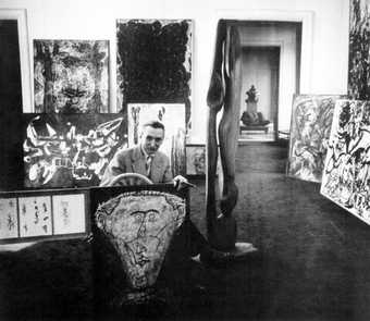 Fig.1 Michel Tapié at Galerie Rive Droite, Paris, 1954, with artworks for the Individualités d’aujourd’hui exhibition