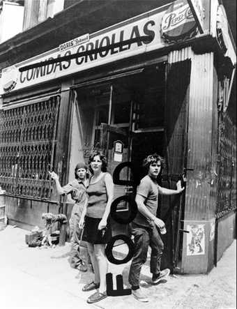 Tina Girouard, Carol Goodden and Gordon Matta-Clark in front of the closed-down bodega that would become their restaurant Food, New York, 1971