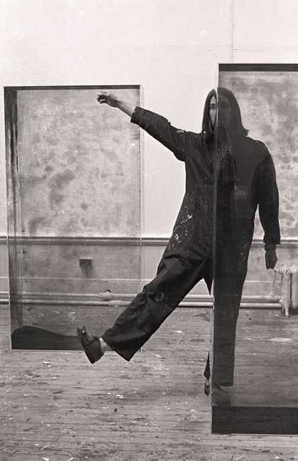 Fig.20 Alexander Hamilton (Edinburgh College of Art student assistant) with two of Erich Reusch’s triplex glass cubes during the installation of Strategy: Get Arts at the Edinburgh College of Art, August 1970