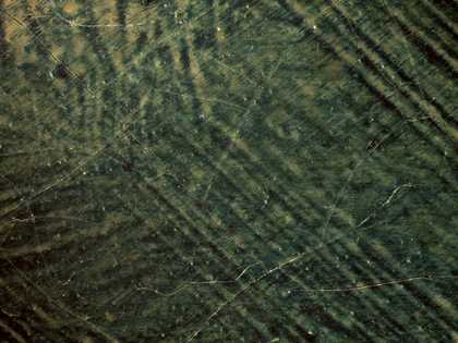 Detail of the blue background within the repainted area of the face
