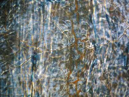 Fig.25 Detail at x8 magnification of the blue glaze over white underpainting in the cloak