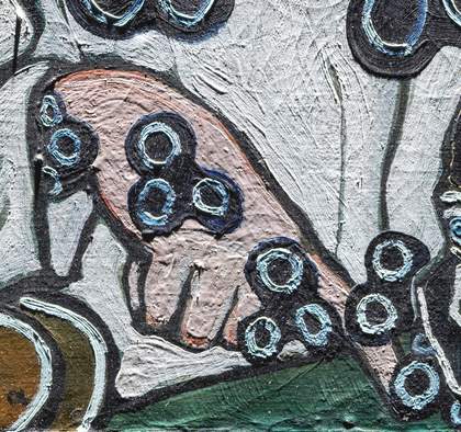 Detail of hand under raking light from top