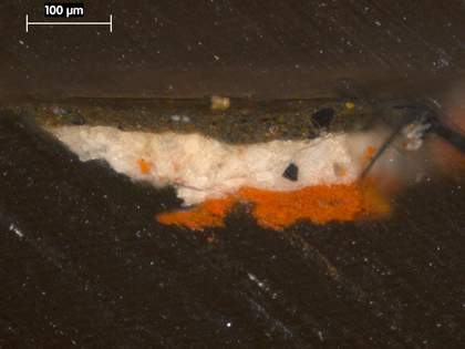 Fig.3 Cross-section from the background, photographed at x250 magnification. From the bottom: red ground; white priming; dark green paint; varnish