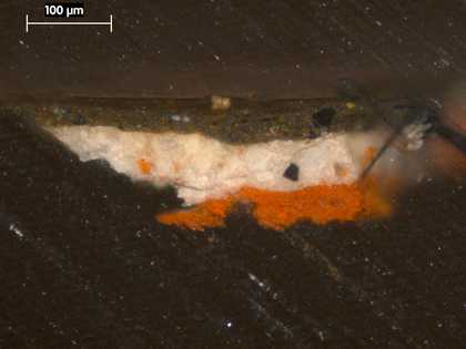 Fig.3 Cross-section from the background, photographed at x250 magnification. From the bottom: red ground; white priming; dark green paint; varnish