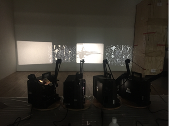 Fig.4 The projectors undergoing testing at N-Space, Tate Store, London, March 2019, using dummy film stock Photo: Hélia Marçal