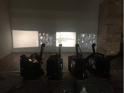 Fig.4 The projectors undergoing testing at N-Space, Tate Store, London, March 2019, using dummy film stock Photo: Hélia Marçal