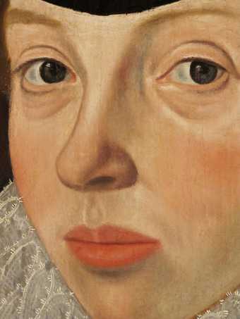 Detail of face, showing smoothly blended, opaque paint and the characteristic ‘oyster’ eye-sockets