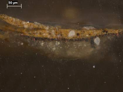 Fig.6 Cross-section from Porter’s yellow jerkin, photographed at x320 magnification. From the bottom: thin layer of glue-size applied to the canvas (which is not present in the sample); grey ground; thin, opaque dark reddish brown underpaint; yellow paint