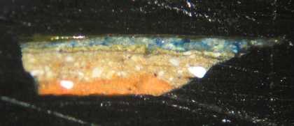 Fig.7 Cross-section through a shadowed area of the blue sash, photographed at x200 magnification.