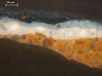 Fig.7 Cross-section through a mid-tone of the blue drapery, photographed at x320 magnification.
