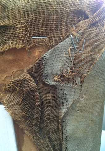 Detail of loosely woven, rough-cut canvas on the reverse side