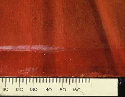 Fig.8 Crimson glaze in the red dress at the bottom edge, unfaded where normally protected by the rebate of the frame