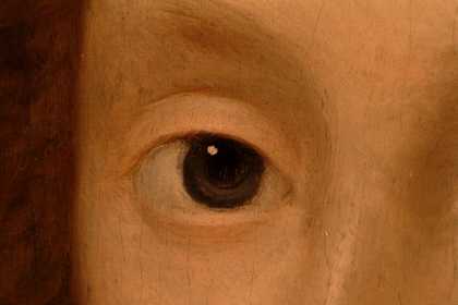 Fig.8 Macro-photograph of the sitter’s right eye, showing initial, red lake-based delineation of the eyelid, iris and pupil