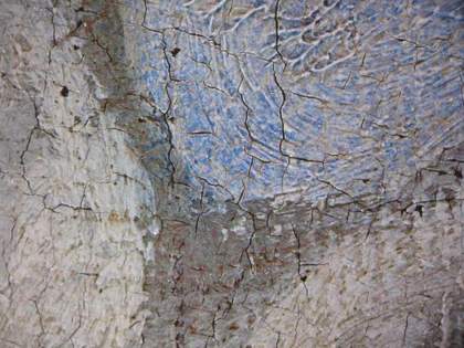 Fig.8 Microphotograph taken at x8 magnification of blue glazes over opaque paint in the frock