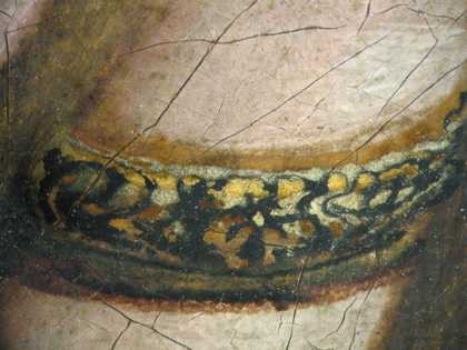 Fig.9 Detail of the ring at x8 magnification, showing the reserve left for it in the flesh paint