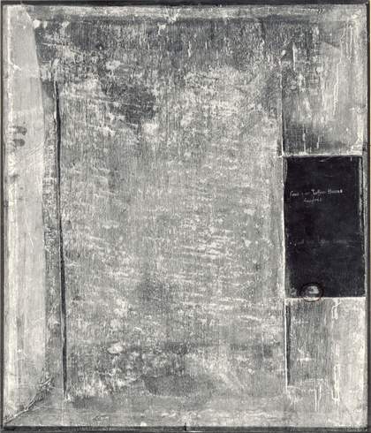 The back of the painting with the original signature and inscription attached to it
