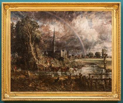 The painting in its new frame, brightly gilded.