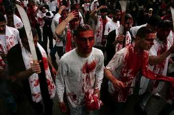 Islamic ritual on the Day of Ashura commemorating the martyrdom of Hussein Ibn Ali, photographed in Lebanon 2009.
