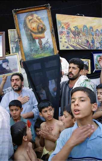 The Day of Ashura with public expressions of mourning for the martyred Hussein Ibn Ali, photographed in Iraq in 2003.