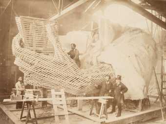Construction of the skeleton and plaster surface of the left arm and hand of the Statue of Liberty, 1883