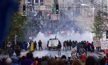Seattle police use gas to push back World Trade Organization protesters in downtown Seattle on November 30, 1999