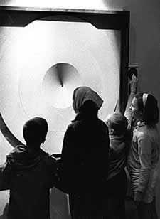 Circular display in the illusion galleries of the US Science Exhibit at the Seattle World's Fair, 1962