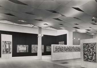 Installation view of an exhibition featuring paintings by Jackson Pollock at Whitechapel Gallery, London, 1958