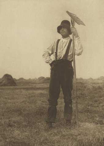 Peter Henry Emerson, Haymaker with Rake (Norfolk) 1888
