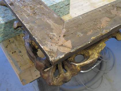 Photograph of the frame corner showing the altered mitre keys