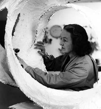 Barbara Hepworth with Oval Form (Trezion) 1963 in the Palais studio 1963