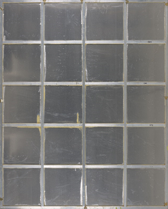 The reverse of the aluminium panel of Water Painting, showing the aluminium bars (6 horizontal, 5 vertical) that cross vertically and horizontally to form a grid-shaped support.