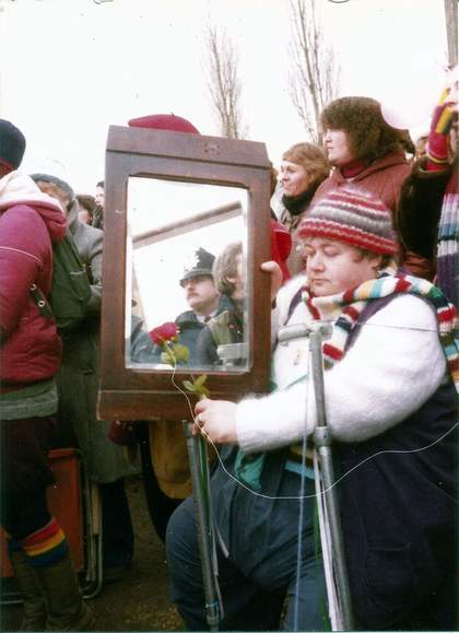 Greenham Common woman with mirror, c.1982–4