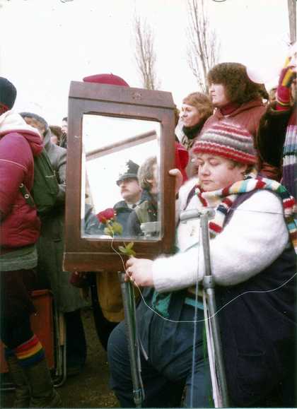 Greenham Common woman with mirror, c.1982–4
