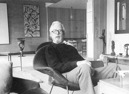 E.J. Power in his flat at 37 Grosvenor Square, London c.1979