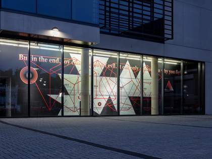 Nighttime street view of Focal Point Gallery