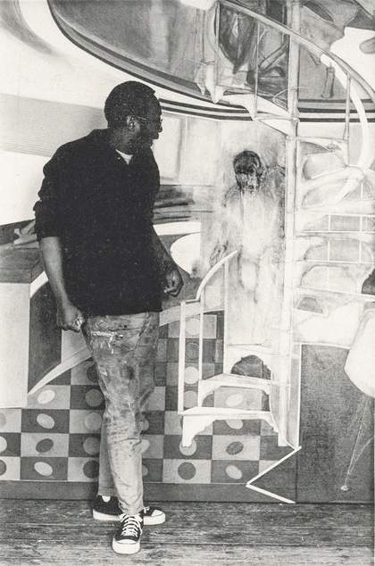 Frank Bowling with his work Mirror 1964–6 at Lupus Street, London, c1964 - Courtesy Frank Bowling Archive