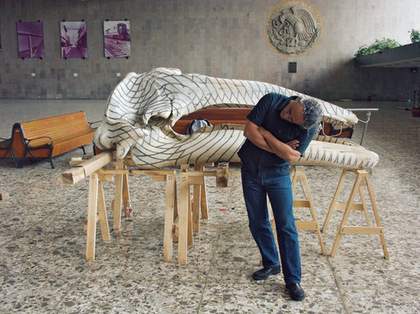 Gabriel Orozco inspecting the skeleton in Buenavista Station Mexico City